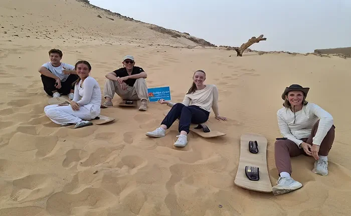 enjoy sandboarding with Golden Luxor Tours